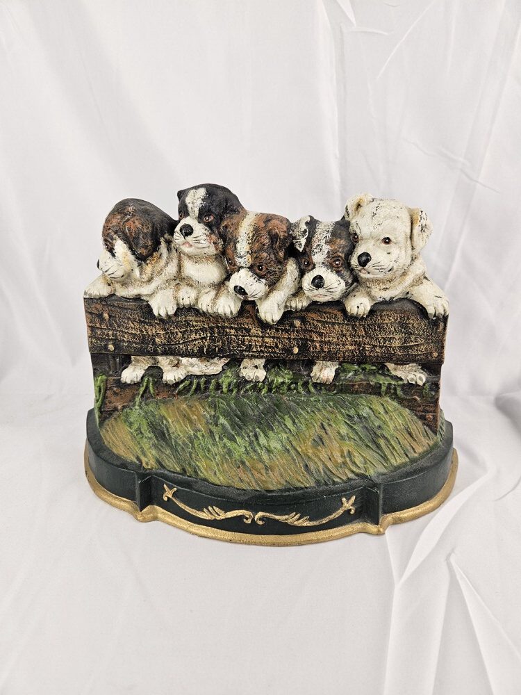 Vintage ijzeren deurstop honden